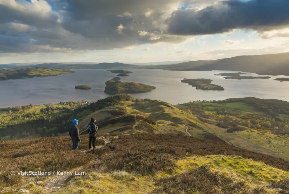 Walkers taking in the view of Loch Lomond from Conic Hill part of the West Highland Way, © VisitScotland / Kenny Lam