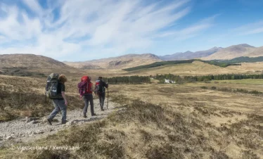 Walkers on the West Highland Way between Bridge of Orchy and Glencoe looking toward the Inveroran Hotel, © VisitScotland / Kenny Lam