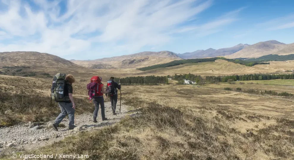 Walkers on the West Highland Way between Bridge of Orchy and Glencoe looking toward the Inveroran Hotel, © VisitScotland / Kenny Lam