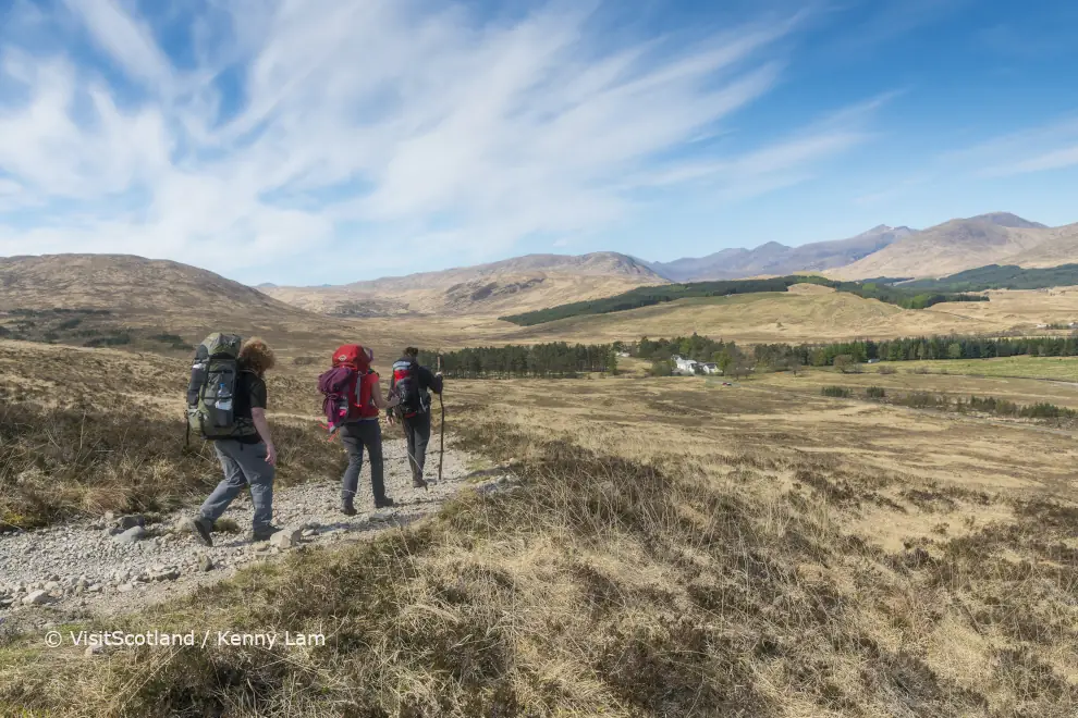 Walkers on the West Highland Way between Bridge of Orchy and Glencoe looking toward the Inveroran Hotel, © VisitScotland / Kenny Lam