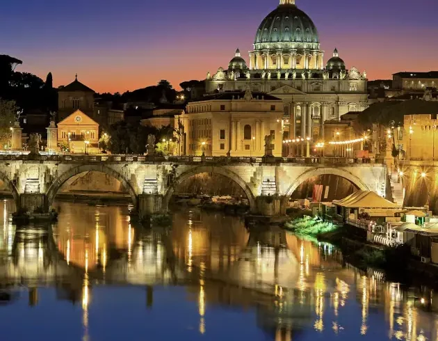 Wanderreise Via Francigena von Viterbo nach Rom: Blick auf den Petersdom am Abend